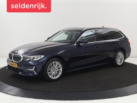 BMW 3 Serie 318i Luxury Line | Sportstoelen | Leder | Carplay | Live Cockpit | Sfeerverlichting | Trekhaak | Parkeerhulp | Climate control | Full LED | Cruise control | Bluetooth