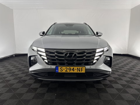 Hyundai Tucson 1.6 T-GDI HEV Comfort Smart (INCL.BTW) *FULL-LED | ADAPTIVE-CRUISE | HEATED-COMFORTSEATS | KEYLESS | CAMERA | DIGI-COCKPIT | PRIVACY-GLASS | SHIFT-PADDLES | ECC | PDC | 17''ALU*