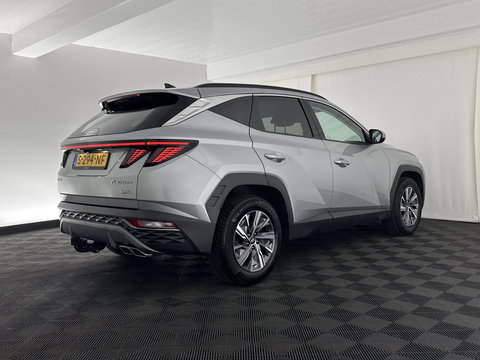 Hyundai Tucson 1.6 T-GDI HEV Comfort Smart (INCL.BTW) *FULL-LED | ADAPTIVE-CRUISE | HEATED-COMFORTSEATS | KEYLESS | CAMERA | DIGI-COCKPIT | PRIVACY-GLASS | SHIFT-PADDLES | ECC | PDC | 17''ALU*