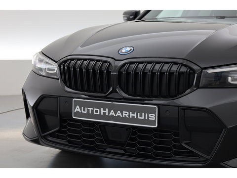 BMW 3 Serie Touring 320e M Sport | Facelift | Shadow Line | Curved display | Adapt. Cruise | Nav + CarPlay | Elek. Klep | Sfeerverlichting | LED | Stoelverw. | PDC V