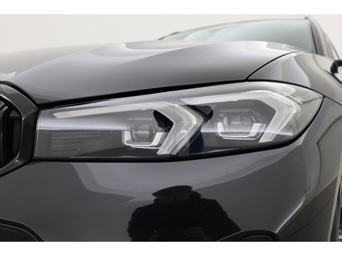 BMW 3 Serie Touring 320e M Sport | Facelift | Shadow Line | Curved display | Adapt. Cruise | Nav + CarPlay | Elek. Klep | Sfeerverlichting | LED | Stoelverw. | PDC V