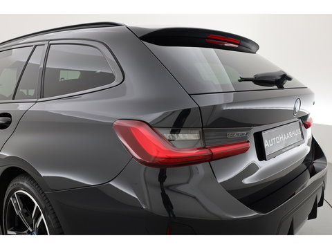 BMW 3 Serie Touring 320e M Sport | Facelift | Shadow Line | Curved display | Adapt. Cruise | Nav + CarPlay | Elek. Klep | Sfeerverlichting | LED | Stoelverw. | PDC V