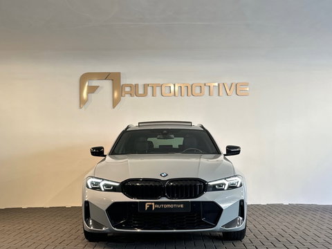 BMW 3 Serie Touring 320e M Sport Pano|Trekhaak|Sfeer|InclBTW