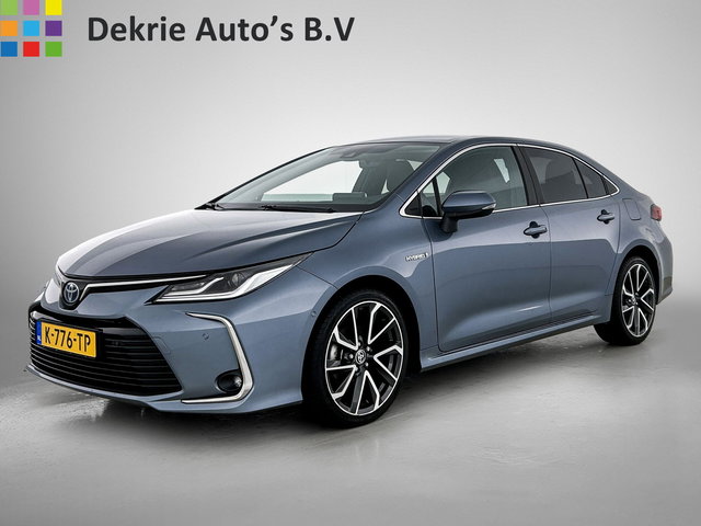 Toyota Corolla - 1.8 Hybrid Executive Sedan / Leder / Navigatie / Xenon / Pdc.V+A / Airco-ecc./ Radio multimedia / Apk 03-2027