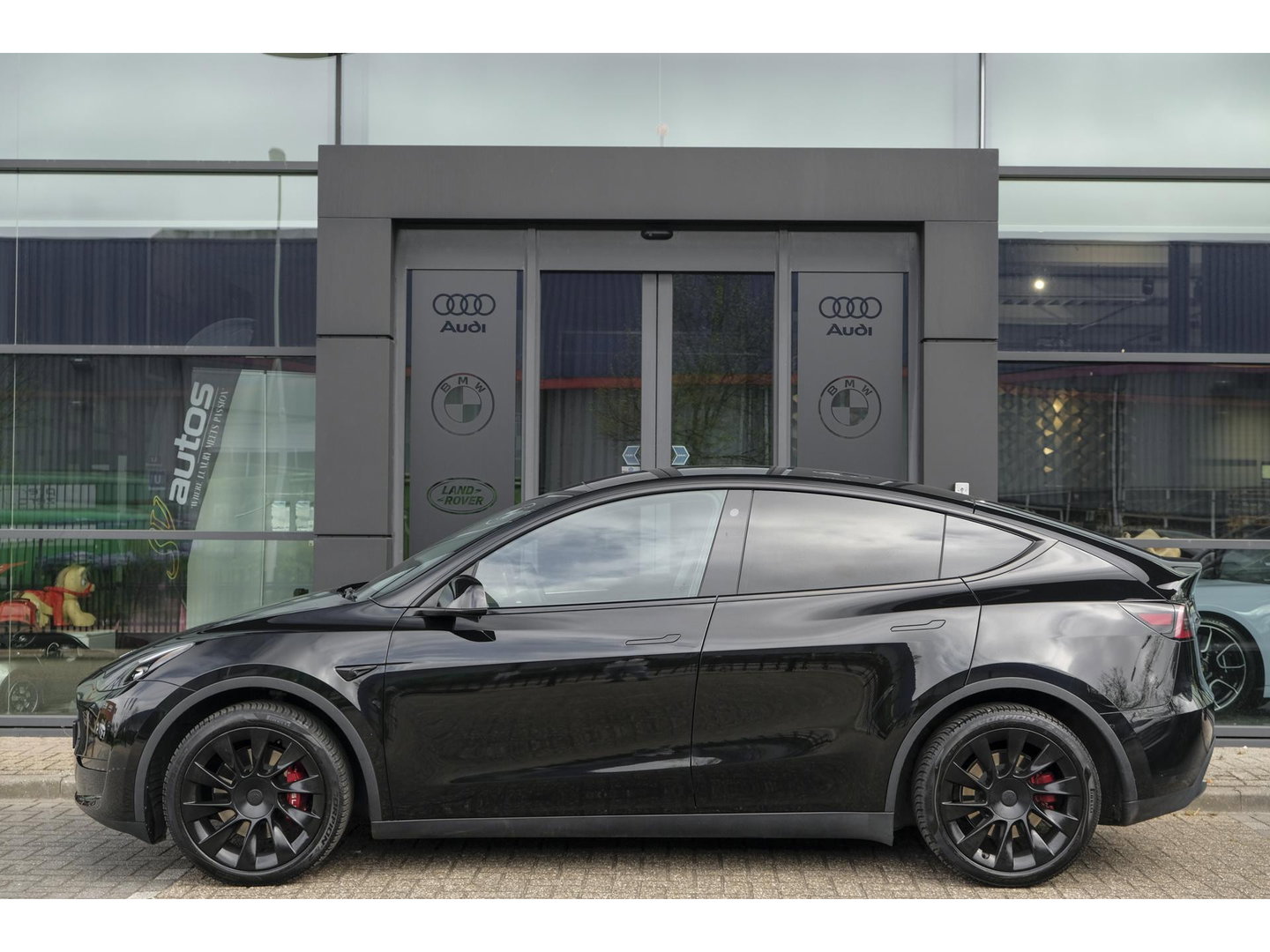 Tesla Model Y RWD 58 kWh Autopilot *BTW* *SOH 93%* 1e eigenaar Black Edition NLauto 20" LMV