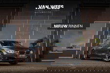 BMW 3 Serie - 320i Upgrade Edition | NL auto | 2e eigenaar | HiFi audio | Xenon | Sportstuur | Stoelverwarming | Navigatie | Bluetooth | Climate control | PDC | Memory | Regensensor