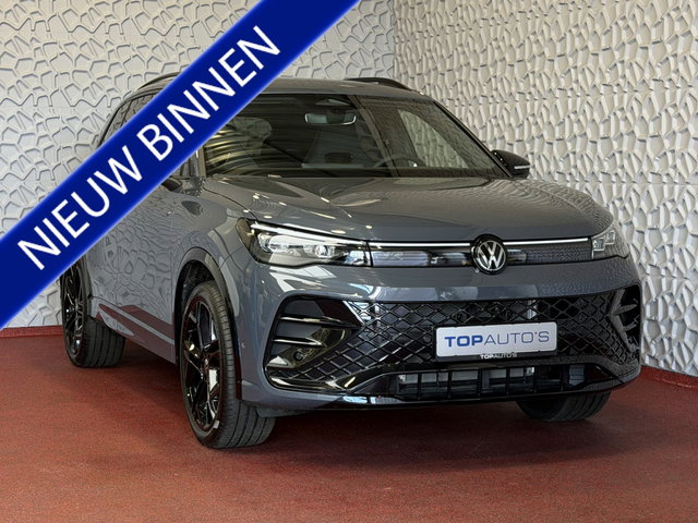 Volkswagen Tiguan - 1.5 eHYBRID 272 PK NW AUTO R-LINE VW.TREKHAAK BLACK PANO XL.NAVI STOEL/STUUR VERW. BLACK.STYLE 360.CAM ELEK.KLEP MATRIX.LED 20''LMV MASSAGE SCHUIFDAK PHEV PLUG IN HYBRID ✅Top Auto's Wijchen , 30 Jaar Specialist in Volkswagen  : Alle Type's : R-Line Editio