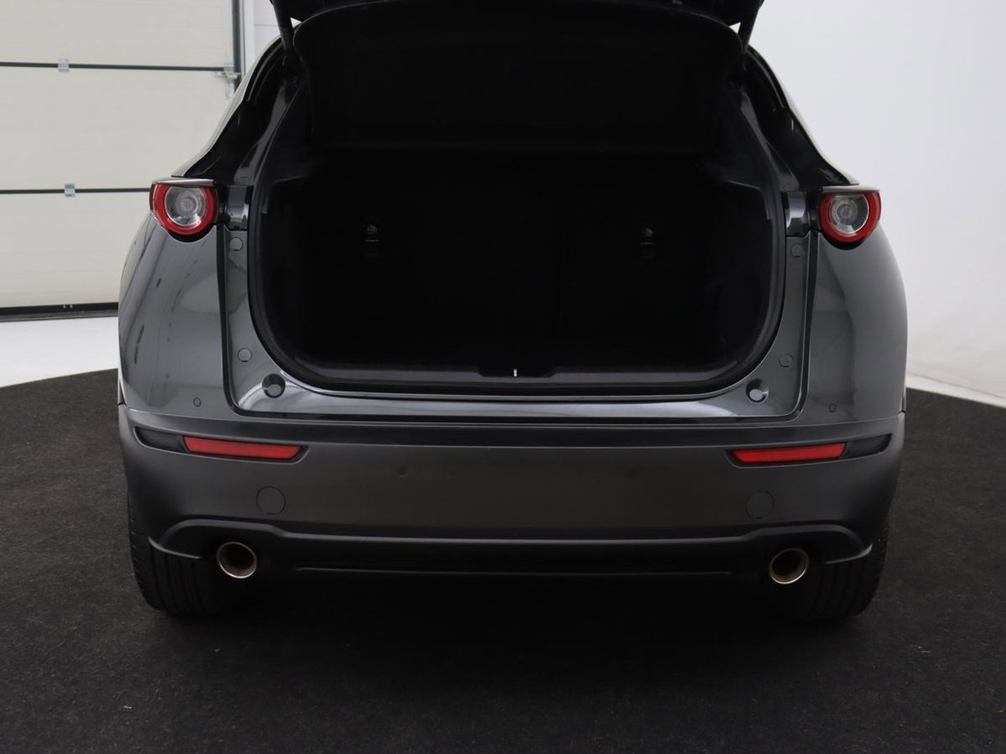 Mazda CX-30 2.0 e-SkyActiv-X M Hybrid Luxury | Leder | Trekhaak | Stoelverwarming | 360 Camera | Head-Up | Carplay | Bose Sound | Stuurverwarming | Navigatie | Keyless | Climate control