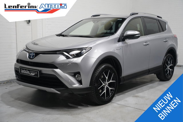 Toyota RAV4 - AWD hybrid style-selection navigatie trekhaak-afneembaar 18"-lmv PDC v+a 360-camera leder/stof bekleding stoelen/stuur verwarmd ECC cruise-controle private-glas stuurbediening keyless entry/start electrische-achterklep