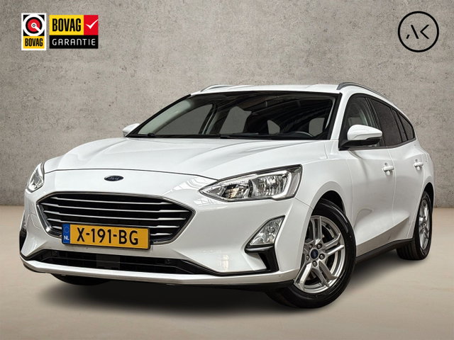 Ford Focus - Wagon 1.0 EcoBoost Titanium Sport (APPLE CARPLAY, GROOT NAVI, STUUR/STOELVERWARMING, SPORTSTOELEN, GETINT GLAS, LM VELGEN, NIEUWE APK, NIEUWSTAAT)