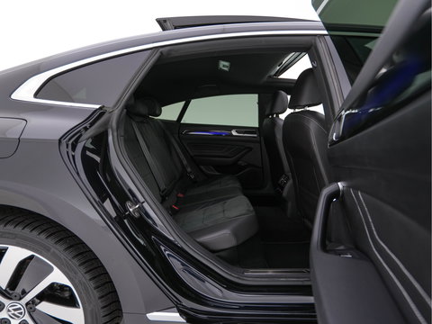 Volkswagen Arteon 1.4 TSI eHybrid R-Line Business+ (INCL.BTW) *PANO | HEAD-UP | LEATHER-MICROFIBRE | FULL-LED | TOP-VIEW | ADAPTIVE-CRUISE | BLINDSPOT | HEATED-SPORTSEATS | KEYLESS | NAVI-FULLMAP | PRIVACY-GLASS | SHIFT-PADDLES | DIGI-COCKPIT
