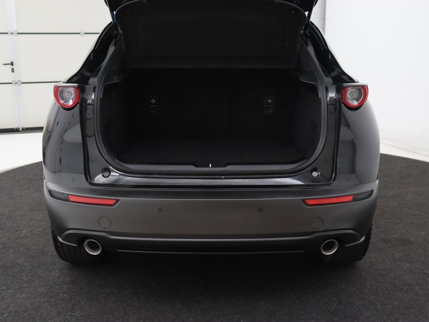Mazda CX-30 2.0 e-SkyActiv-X M Hybrid Comfort | Stoelverwarming | Head-Up | Camera | Carplay | Adaptive cruise | Navigatie | Stuurverwarming | 18'' | Keyless | Full LED | Climate control