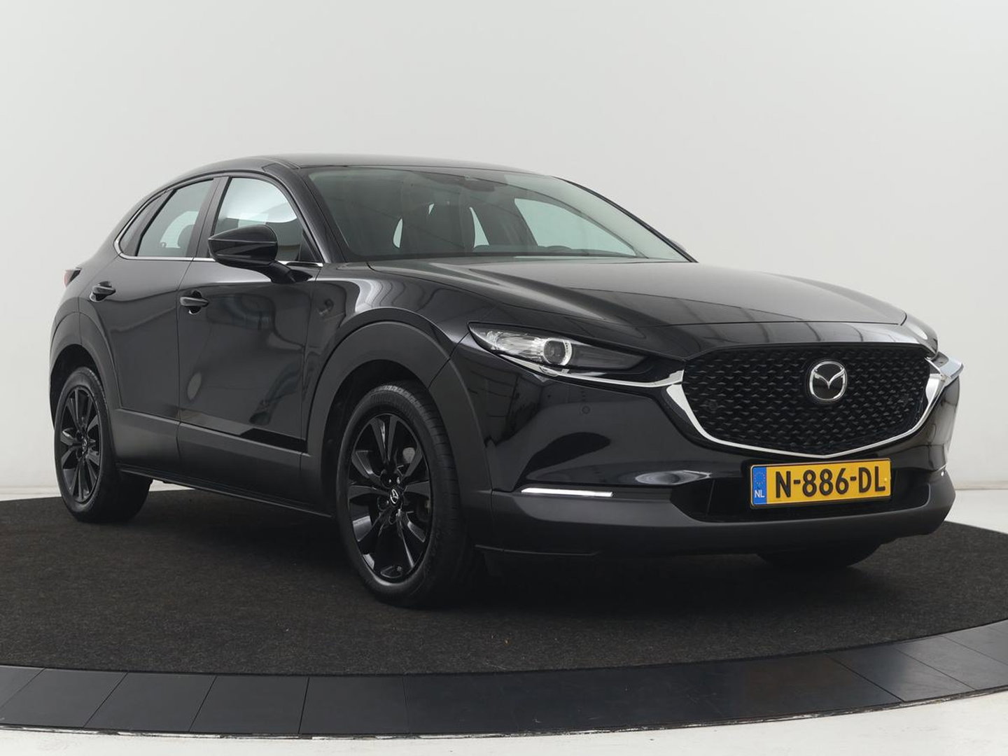 Mazda CX-30 2.0 e-SkyActiv-X M Hybrid Comfort | Stoelverwarming | Head-Up | Camera | Carplay | Adaptive cruise | Navigatie | Stuurverwarming | 18'' | Keyless | Full LED | Climate control