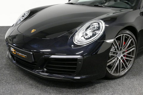Porsche 911 Cabrio 3.0 Carrera S / Sportuitlaat / Elektr. verstelbare stoelen + memory (14wegs) / PDLS+ / Sport-Chrono Pakket / Stoelverwarming / Apple Carplay / BOSE audio systeem / 21'' LMV / Achteruitrijcamera / Cruise Control