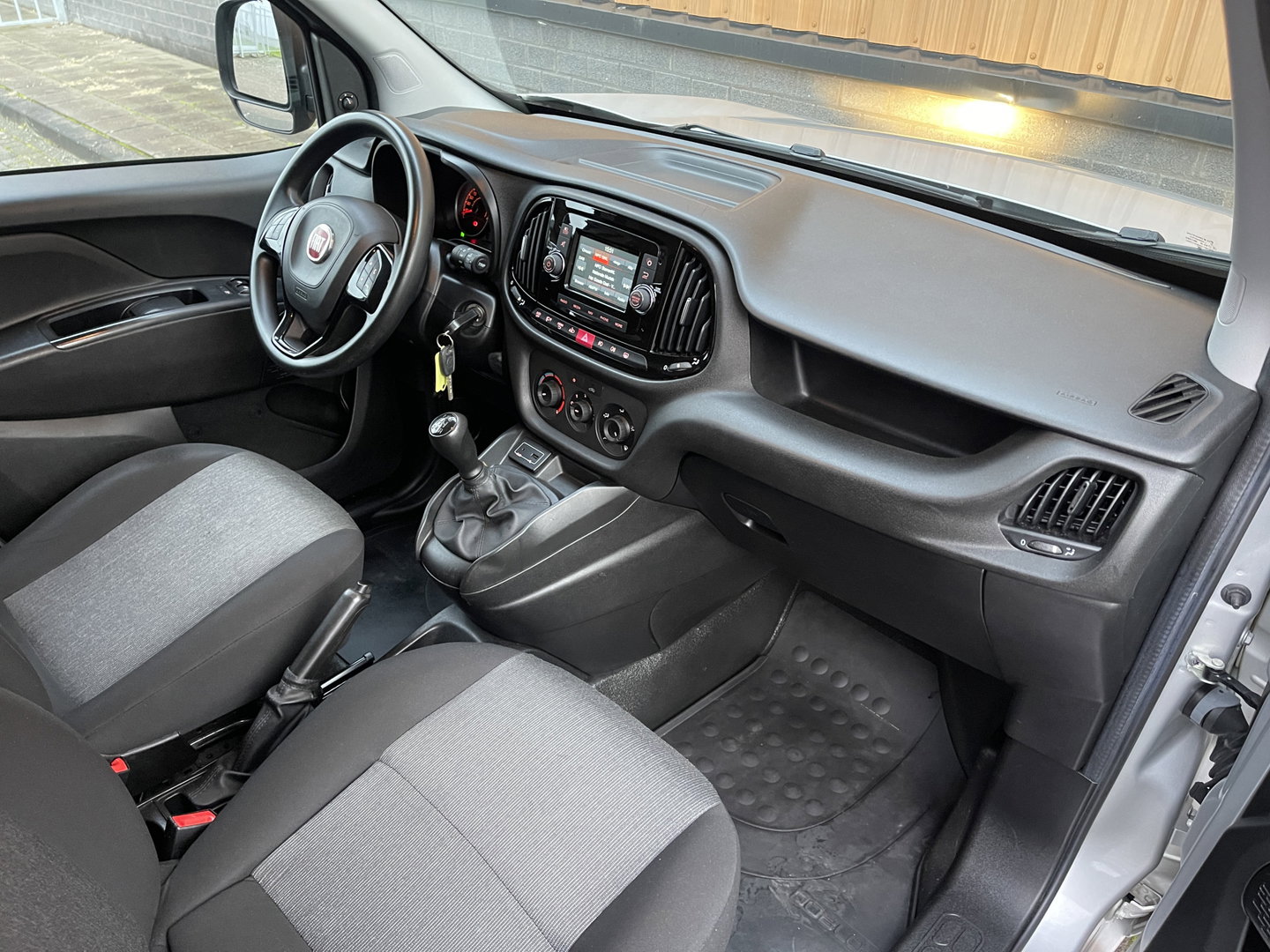 Fiat Doblò 1.3 MJ L1 | Ex. BTW | Trekhaak | | Navigatie | Airconditioning | Cruise Control | Bluetooth | DAB | Multifunctioneel Stuurwiel | Elektrische Spiegels | Elektrische Ramen |