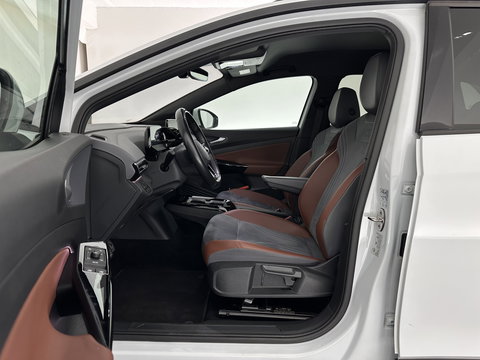 Volkswagen ID.4 Business 77 kWh [ 3-Fase-11kW ] {SOH-83%} (INCL.BTW) *LEATHER-FABRIC | ADAPTIVE-CRUISE | FULL-LED | HEATED-COMFORTSEATS | KEYLESS | CAMERA | DIGI-COCKPIT | DAB | NAVI-FULLMAP | PRIVACY-GLASS | ECC | PDC | TOWBAR | 19''ALU*