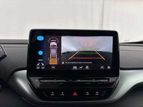 Volkswagen ID.4 Business 77 kWh [ 3-Fase-11kW ] {SOH-83%} (INCL.BTW) *LEATHER-FABRIC | ADAPTIVE-CRUISE | FULL-LED | HEATED-COMFORTSEATS | KEYLESS | CAMERA | DIGI-COCKPIT | DAB | NAVI-FULLMAP | PRIVACY-GLASS | ECC | PDC | TOWBAR | 19''ALU*