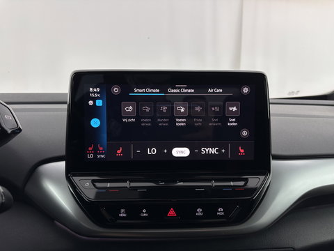 Volkswagen ID.4 Business 77 kWh [ 3-Fase-11kW ] {SOH-83%} (INCL.BTW) *LEATHER-FABRIC | ADAPTIVE-CRUISE | FULL-LED | HEATED-COMFORTSEATS | KEYLESS | CAMERA | DIGI-COCKPIT | DAB | NAVI-FULLMAP | PRIVACY-GLASS | ECC | PDC | TOWBAR | 19''ALU*