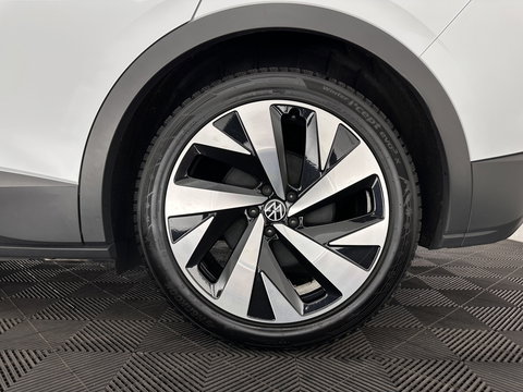 Volkswagen ID.4 Business 77 kWh [ 3-Fase-11kW ] {SOH-83%} (INCL.BTW) *LEATHER-FABRIC | ADAPTIVE-CRUISE | FULL-LED | HEATED-COMFORTSEATS | KEYLESS | CAMERA | DIGI-COCKPIT | DAB | NAVI-FULLMAP | PRIVACY-GLASS | ECC | PDC | TOWBAR | 19''ALU*