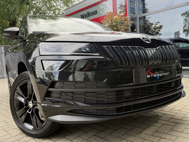 Škoda Karoq - 1.5 TSI ACT AUT. *!* SPORTLINE *!* NAVI/ CARPLAY/ CAMERA/ TREKHAAK/ RADAR/ 27 DKM *!*