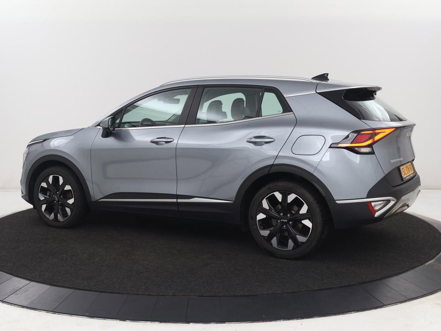Kia Sportage 1.6 T-GDi Plug-in Hybrid AWD DynamicLine | SOH 97,2% | Camera | Carplay | Adaptive cruise | Navigatie | 19'' | Full LED | Climate control | PHEV