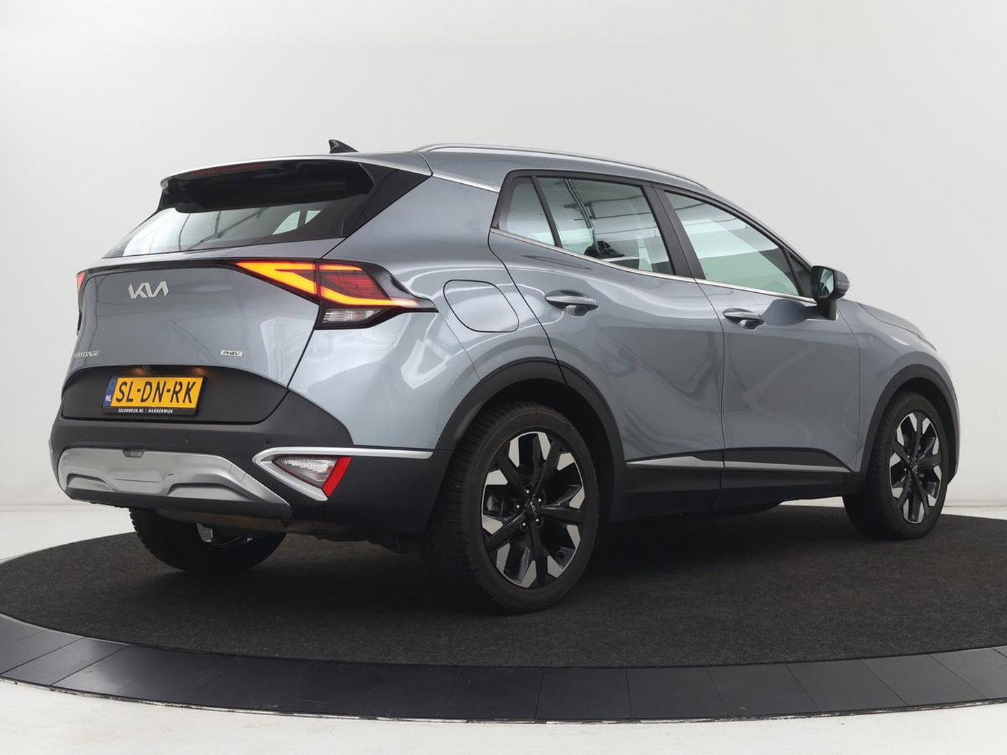 Kia Sportage 1.6 T-GDi Plug-in Hybrid AWD DynamicLine | SOH 97,2% | Camera | Carplay | Adaptive cruise | Navigatie | 19'' | Full LED | Climate control | PHEV