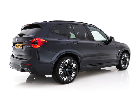 BMW iX3 High Executive 80 kWh Facelift [ 3-Fase-11kW) ] {SOH-100%} (INCL-BTW) Aut. *PANO | LEATHER | ADAPTIVE-CRUISE | FULL-LED | HARMAN/KARDON | TOPVIEW | MEMORY-PACK | BLINDSPOT | DIGI-COCKPIT | HEATED-COMFORTSEATS | DAB+ | NAVI-FULLMAP | HEAD-UP | 20''ALU