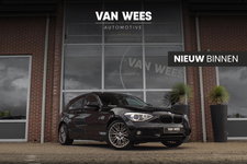BMW 1 Serie - 116i Executive | Sportstuur | Cruise control | Xenon | Stoelverwarming | Dakraam | Climate control | Navigatie Professional | Bluetooth | Lichtpakket | PDC | 18 inch