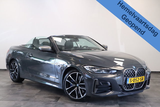 BMW 4 Serie - Cabrio M440i xDrive High-Executive 374PK Individueel-lak Navigatie  Volleder 19LMV Head up * Hemelvaartsdag geopend van 12:00 tot 17:00u *