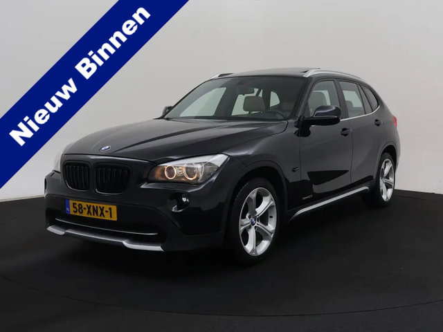 BMW X1 - sDrive20i Aut. | Xenon | Panodak | Navi | Leder | AGR | Clima | Trekhaak |  07-2012 149.773 KM