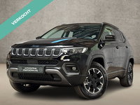Jeep Compass - 4xe 240 Plug-in Hybrid Electric Trailhawk 240Pk Automaat (PANORAMADAK, VIRTUAL COCKPIT, APPLE CARPLAY, GROOT NAVI, CAMERA, SPORTSTOELEN, LEDER, ADAPTIVE CRUISE, NIEUWSTAAT)