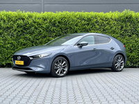 Mazda 3 - 2.0 e-SkyActiv-X M Hybrid 180 Luxury, BOSE SOUND, NAVIGATIE, KEYLESS, CRUISE CONTROL, CLIMATE CONTROL, STOEL/STUURVERWARMING, LED, DAB, PDC, LICHTMETAAL 18"