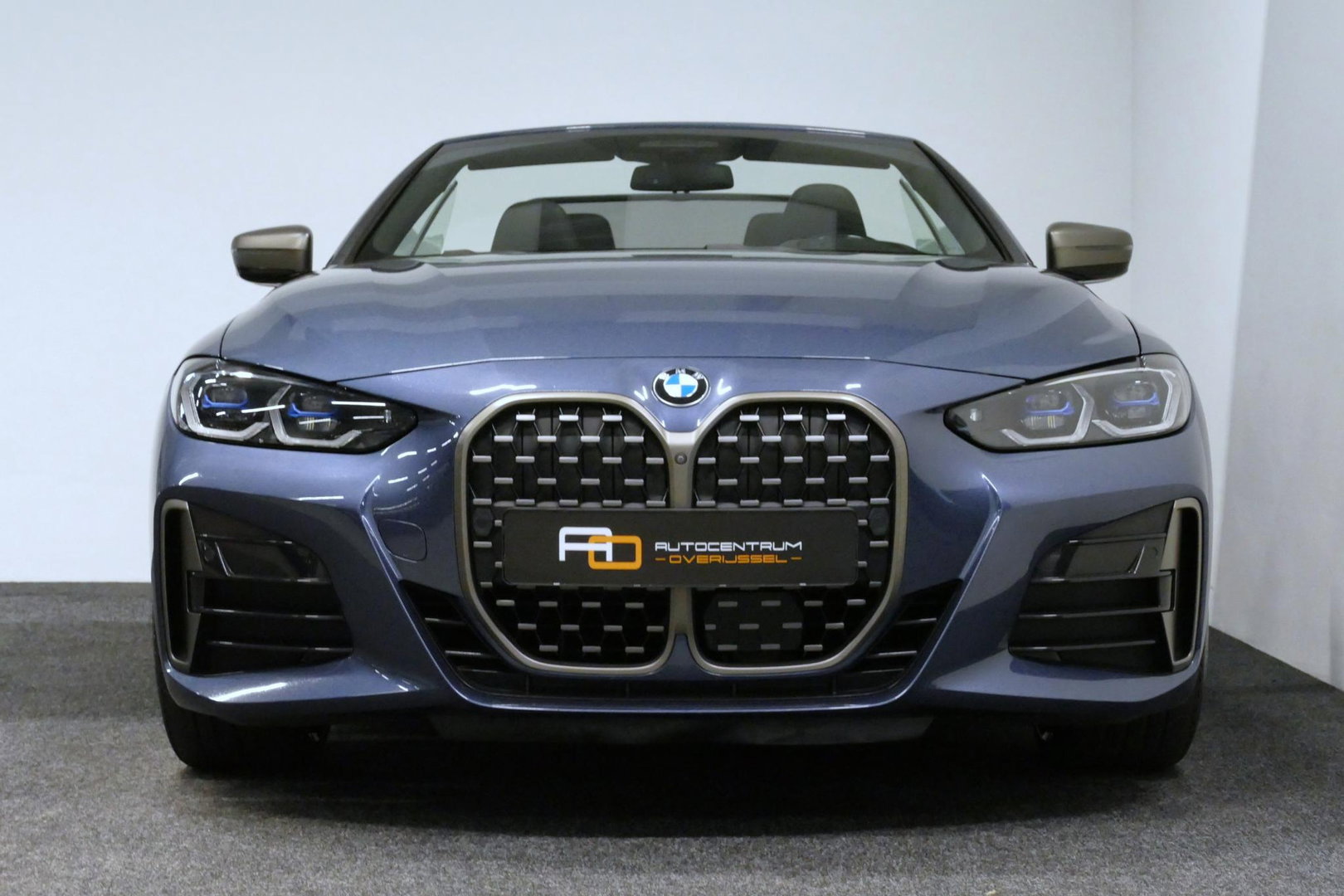 BMW 4 Serie Cabrio M440i xDrive High Executive / Air Collar (nekverwarming / BMW Laserlight / Elektr. verstelbare voorstoelen (links met memory) / Harman Kardon Surround Sound / Stoelverwarming / 20" / Rondomzichtcamera / HUD / Apple Carplay - Android Auto / Adaptief
