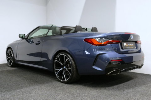BMW 4 Serie Cabrio M440i xDrive High Executive / Air Collar (nekverwarming / BMW Laserlight / Elektr. verstelbare voorstoelen (links met memory) / Harman Kardon Surround Sound / Stoelverwarming / 20" / Rondomzichtcamera / HUD / Apple Carplay - Android Auto / Adaptief