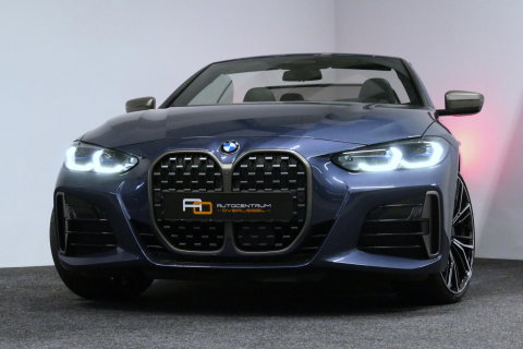 BMW 4 Serie Cabrio M440i xDrive High Executive / Air Collar (nekverwarming / BMW Laserlight / Elektr. verstelbare voorstoelen (links met memory) / Harman Kardon Surround Sound / Stoelverwarming / 20" / Rondomzichtcamera / HUD / Apple Carplay - Android Auto / Adaptief