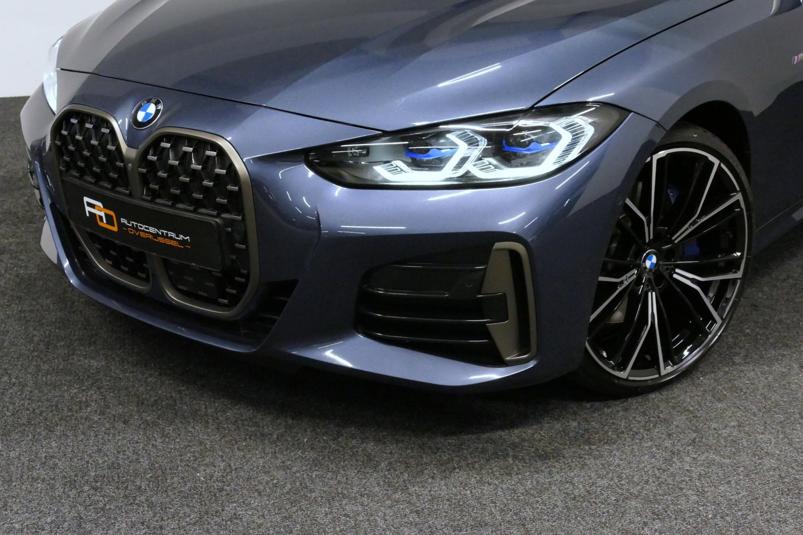 BMW 4 Serie Cabrio M440i xDrive High Executive / Air Collar (nekverwarming / BMW Laserlight / Elektr. verstelbare voorstoelen (links met memory) / Harman Kardon Surround Sound / Stoelverwarming / 20" / Rondomzichtcamera / HUD / Apple Carplay - Android Auto / Adaptief