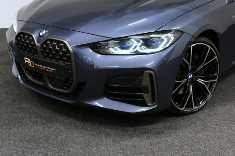 BMW 4 Serie Cabrio M440i xDrive High Executive / Air Collar (nekverwarming / BMW Laserlight / Elektr. verstelbare voorstoelen (links met memory) / Harman Kardon Surround Sound / Stoelverwarming / 20" / Rondomzichtcamera / HUD / Apple Carplay - Android Auto / Adaptief
