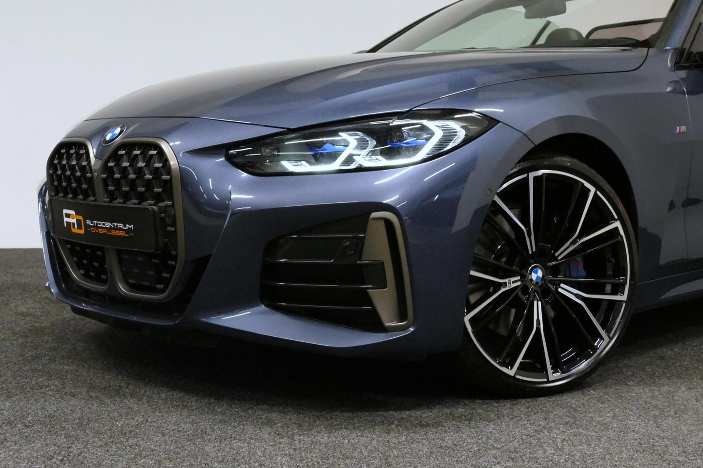 BMW 4 Serie Cabrio M440i xDrive High Executive / Air Collar (nekverwarming / BMW Laserlight / Elektr. verstelbare voorstoelen (links met memory) / Harman Kardon Surround Sound / Stoelverwarming / 20" / Rondomzichtcamera / HUD / Apple Carplay - Android Auto / Adaptief