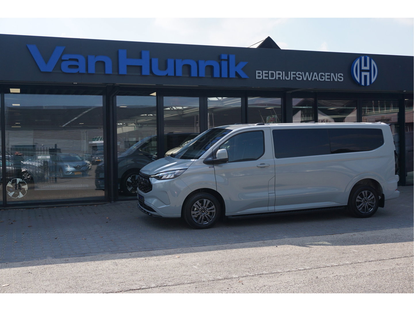 Ford Transit Custom 320L 2.5 PHEV 233PK Dubbel Cabine JWR Edition PRIJS INCL. BPM !! 13" Navi, Adap. Cruise, Camera, 18" LM, Trekhaak!! NR. HYBDCG