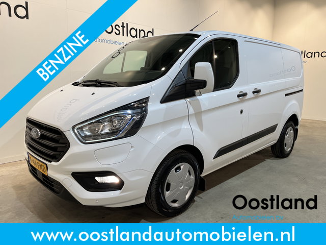 Ford Transit Custom - 340 L1H1 PHEV Benzine Hybride Trend / Euro 6 / Schuifdeur L + R / Airco / CarPlay / Cruise Control / Camera / Navigatie / Klep / 3-Zits / 18.300 KM !!