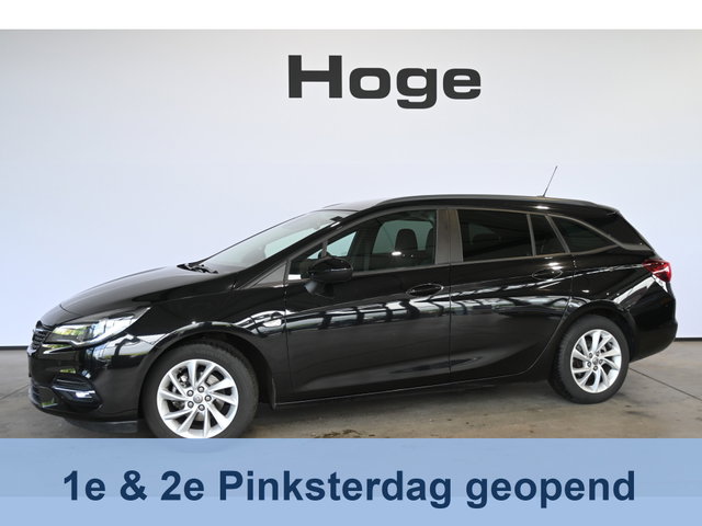 Opel Astra - Sports Tourer 1.2 Business Edition Nap! Clima Navigatie Trekhaak Cruise control 1e Eigenaar 100% Onderhouden! Inruil Mogelijk!