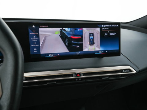 BMW iX xDrive40 High Executive 77 kWh [ 3-Fase ] (INCL-BTW) *PANO | HEAD-UP | SOFT-CLOSE | LEATHER | TOPVIEW | FULL-LED | MEMORY-PACK | HARMAN/KARDON | BLINDSPOT | WIDESCREEN-COCKPIT | HEATED-COMFORTSEATS | DAB | AMBIENTLIGHT | TOWBAR | 22'