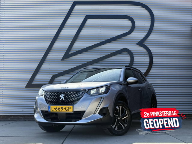 Peugeot 2008 - 1.2 PureTech Blue Lease Allure 2e Eigenaar|Navi|Camera|D-riem v.v. in 2026|Clima|Cruise|Carplay|APK tot 02-2028