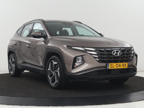 Hyundai Tucson 1.6 T-GDI PHEV Comfort 4WD | SOH 97,9% | Adaptive cruise | Camera | Carplay | Navigatie | Climate control | Parkeerhulp | 19'' | Digital Cockpit | DAB | Bluetooth | Plug In