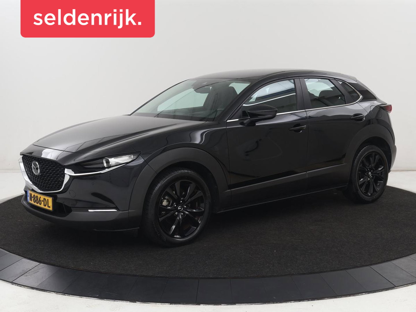 Mazda CX-30 2.0 e-SkyActiv-X M Hybrid Comfort | Stoelverwarming | Head-Up | Camera | Carplay | Adaptive cruise | Navigatie | Stuurverwarming | 18'' | Keyless | Full LED | Climate control