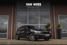 BMW 1 Serie - 116i Executive | Sportstuur | Cruise control | Xenon | Stoelverwarming | Dakraam | Climate control | Navigatie Professional | Bluetooth | Lichtpakket | PDC | 18 inch