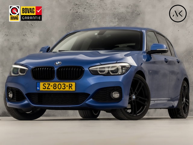 BMW 1 Serie - 118i M Sport High Executive Automaat (GROOT NAVI, M PAKKET, VIRTUAL COCKPIT, LEDER, STOELVERWARMING, SPORTSTOELEN, GETINT GLAS, PARKEERSENSOREN, NIEUWE APK, NIEUWSTAAT)
