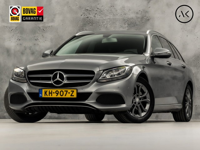 Mercedes-Benz C-Klasse - 180 Sport Automaat (NAVIGATIE, LEDER, CAMERA, STOELVERWARMING, SPORTSTOELEN, GETINT GLAS, ELEKTISCHE ACHTERKLEP, TREKHAAK, NIEUWE APK, NIEUWSTAAT)
