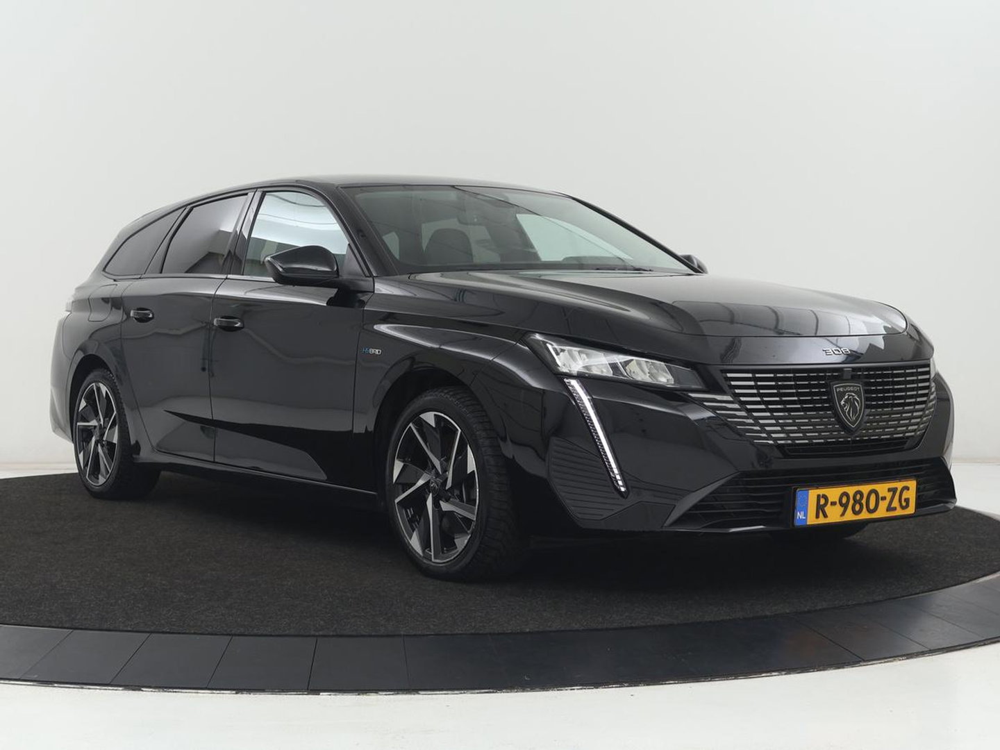 Peugeot 308 1.6 HYbrid 180 Allure Pack Business | SOH 92,4% | Stoelverwarming | Adaptive cruise | Carplay | Half leder | Navigatie | Camera | keyless | Full LED | PHEV | Plug In