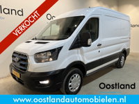 Ford E-Transit - 390 (3500 kg) L2H2 Trend 68 kWh / 100% Elektrisch !! / Airco / Cruise Control / CarPlay / Camera / Navigatie / 3-Zits / 12.200 KM !!